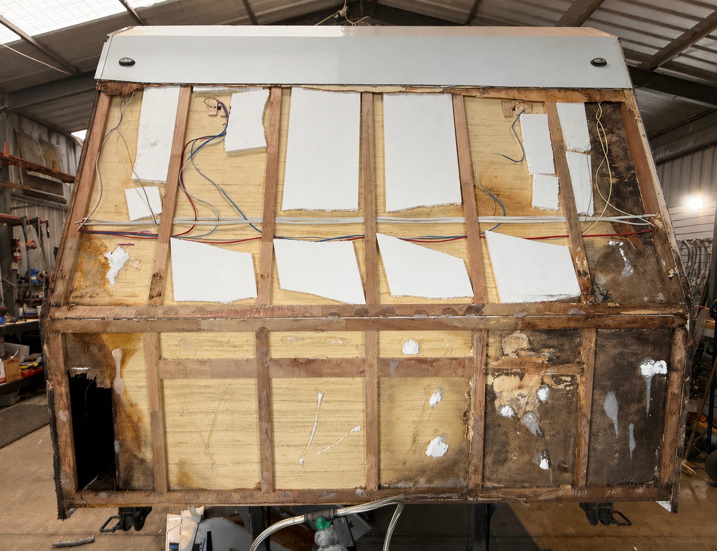 Caravan stripped to the frame for a water damage rebuild at MBCC